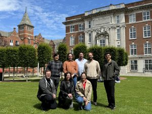 The lab in 2024, minus Charlie. Enjoying warm sunny weather!